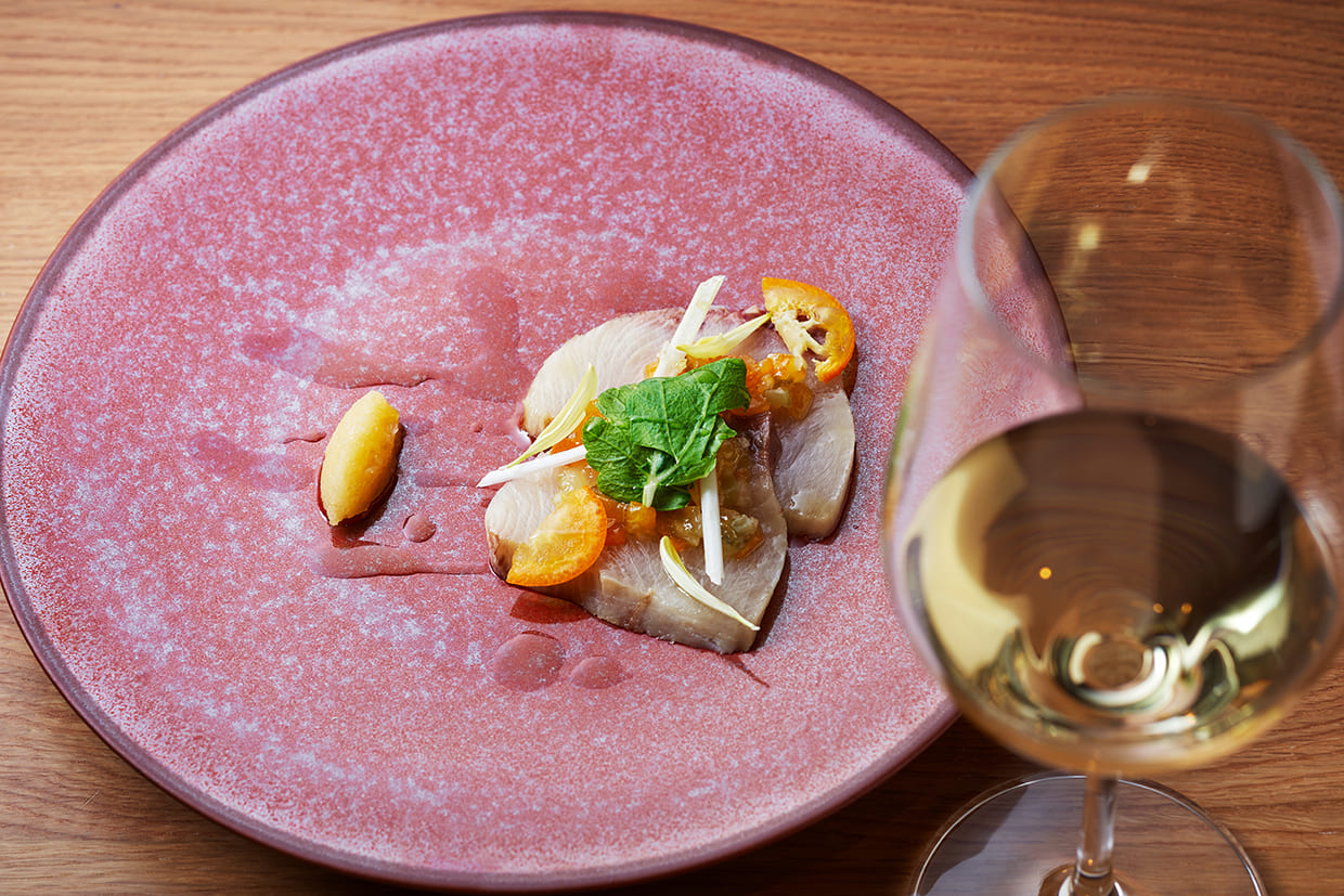 『イゾラータ』のブリと金柑のカルパッチョ